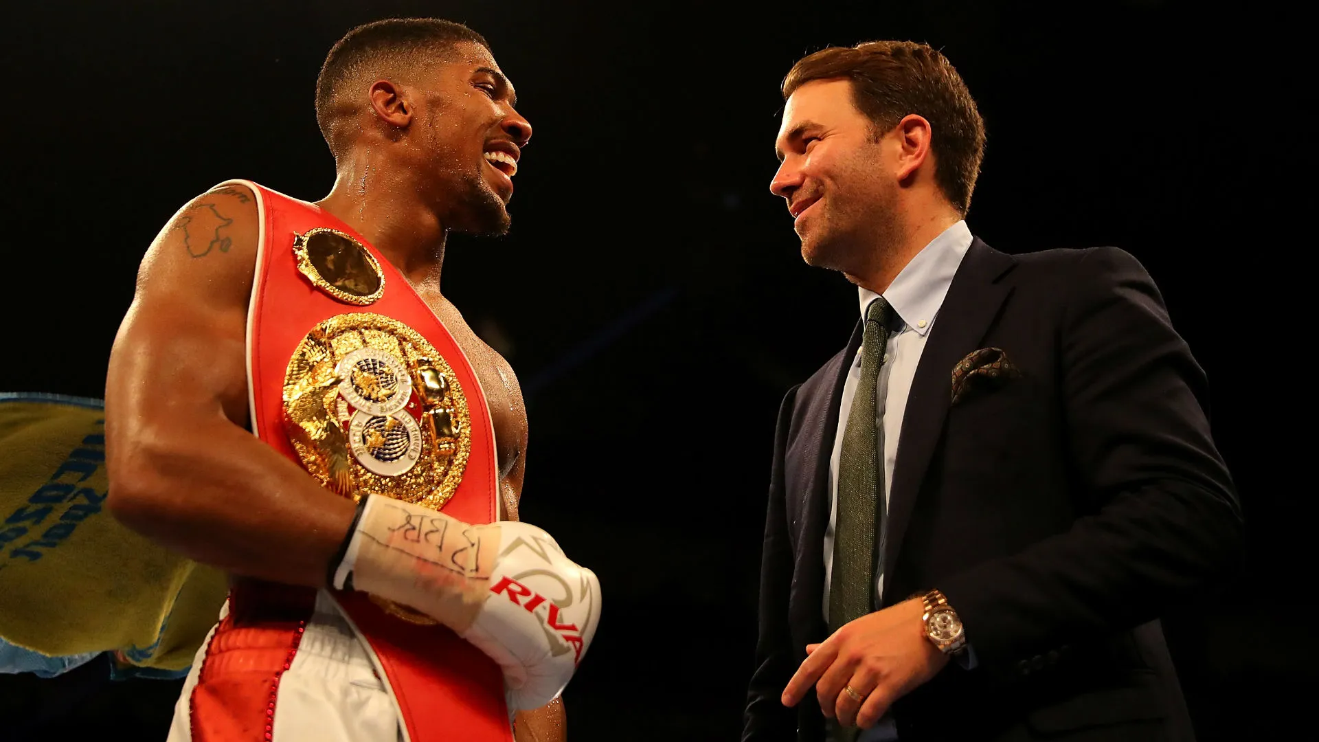 anthony-joshua-eddie-hearn-cropped_y8o3o8290dkm1ee6mg51mrcgq.jpg