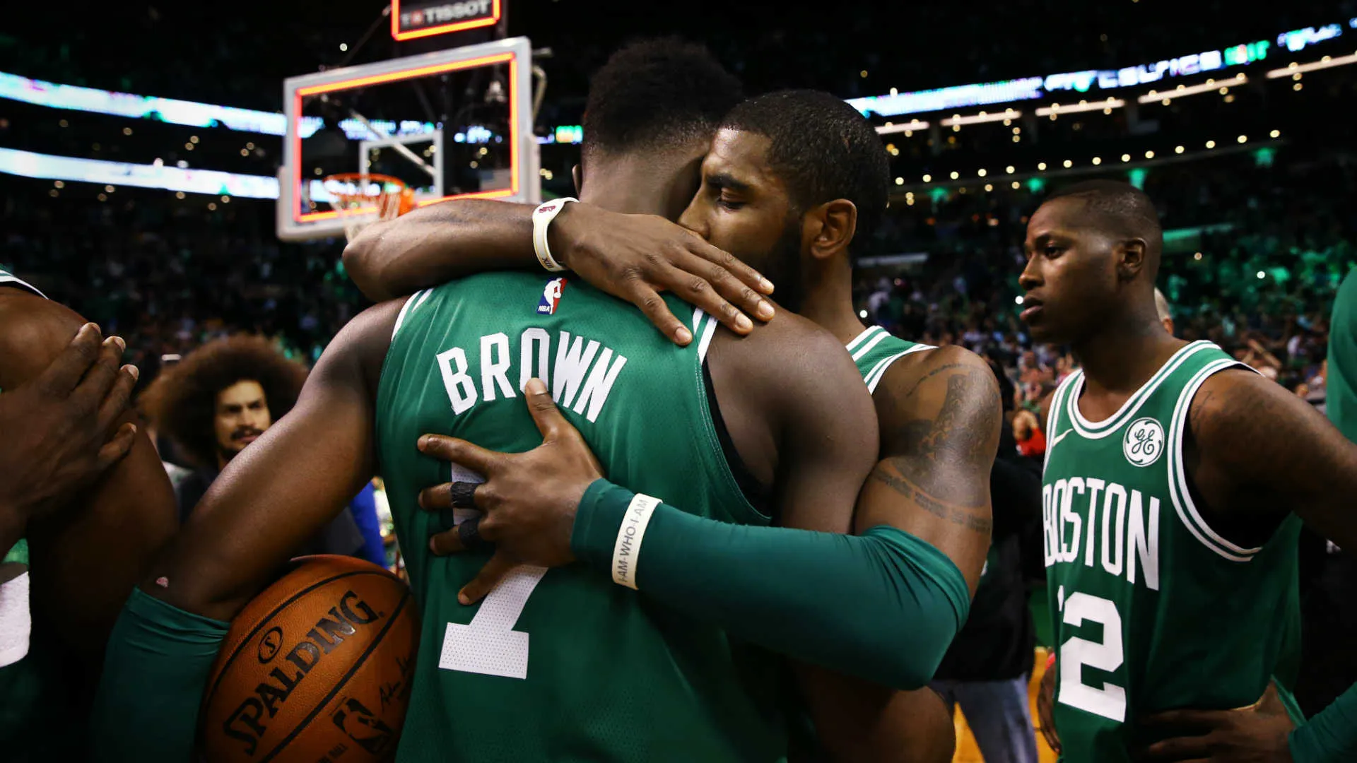 kyrie-irving-right-hugs-jaylen-brown_1e4kl00o3lp9g11ohxof35fbij.jpg