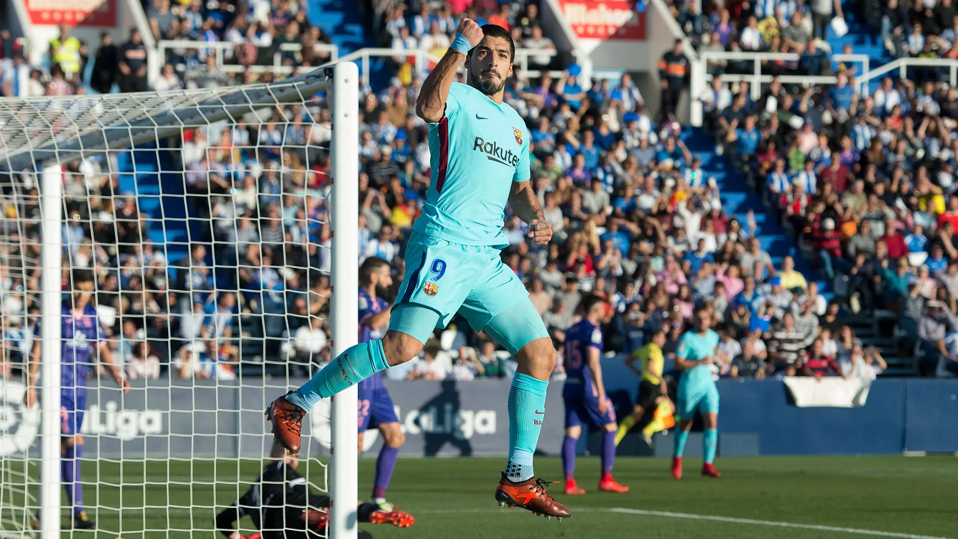 suarez-cropped_1f9a5rjcggbdl1jukf7x8u2goy.jpg
