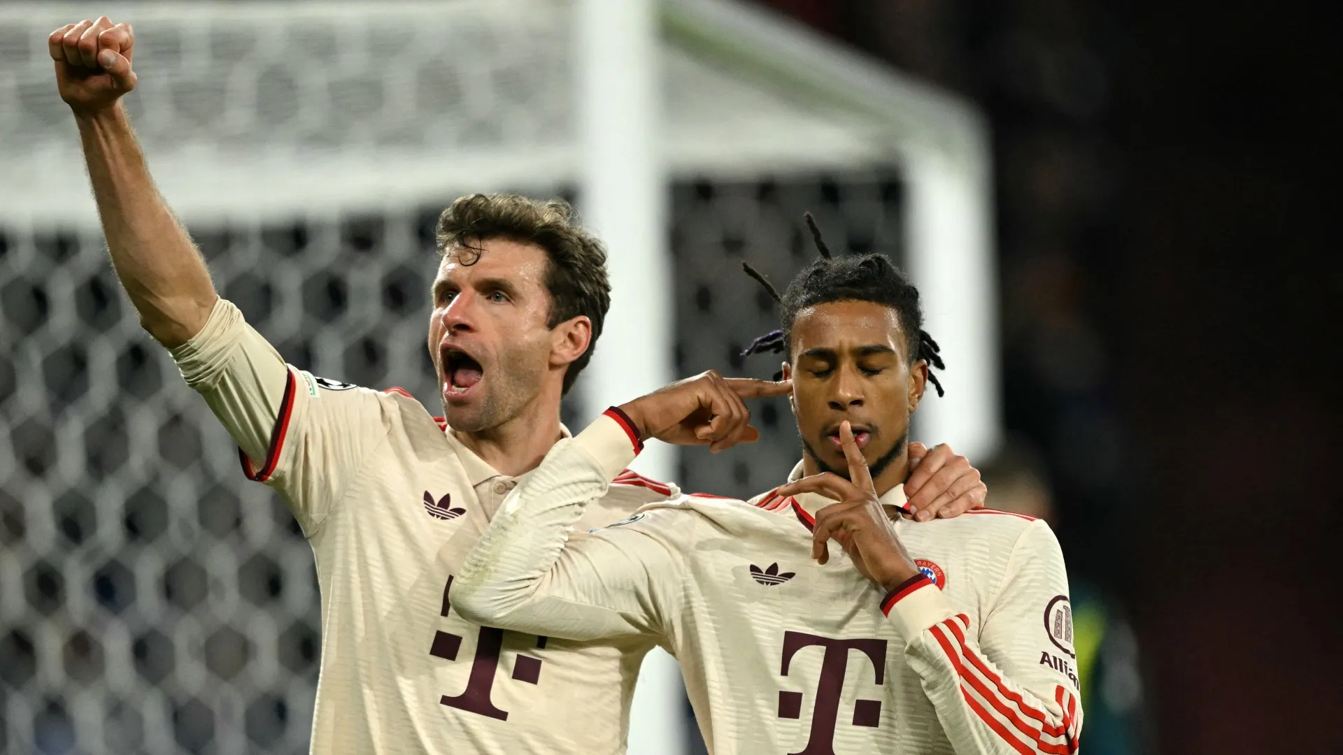 thomas-muller-and-michael-olise_1lv3zo8qchmyl1bojl6dl795m3.jpg