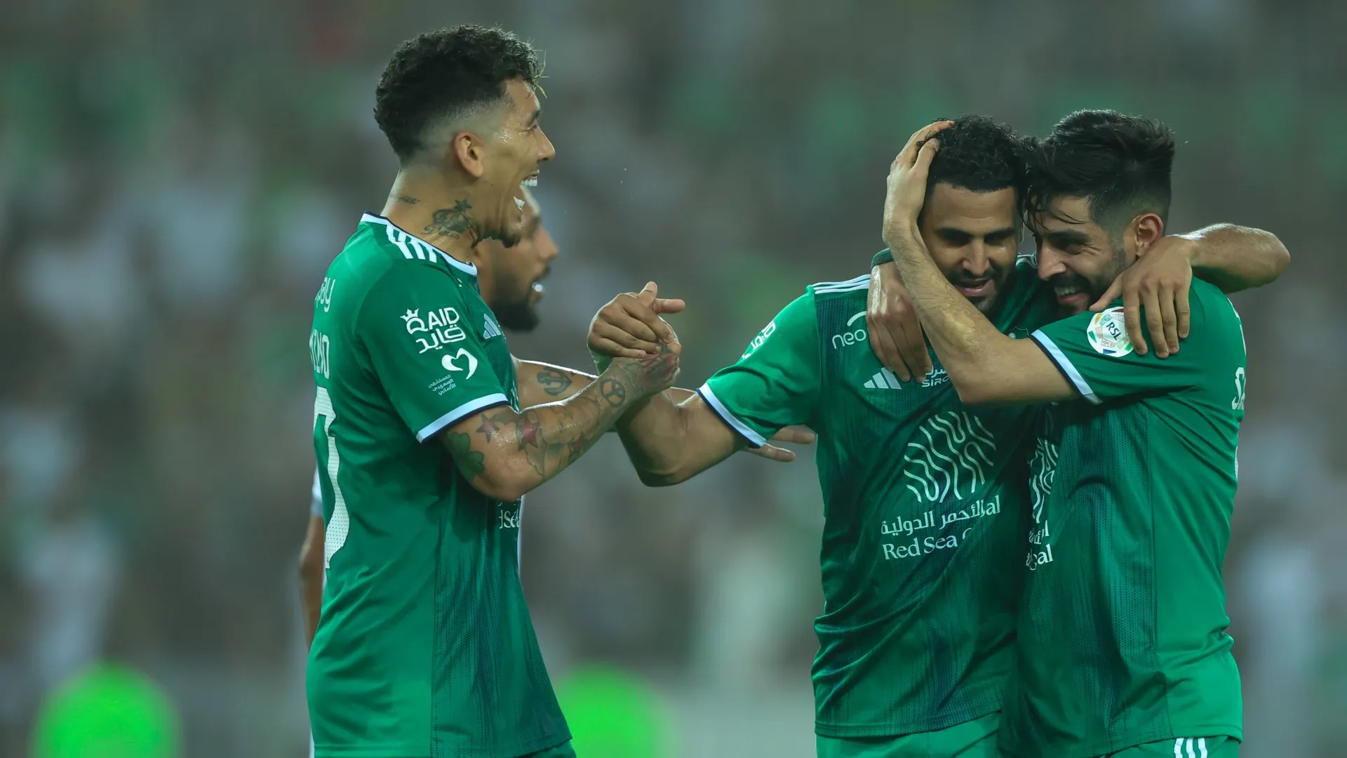 roberto-firmino-and-riyad-mahrez_1vrtvqhilhez01lvp2d2khifkm.jpg