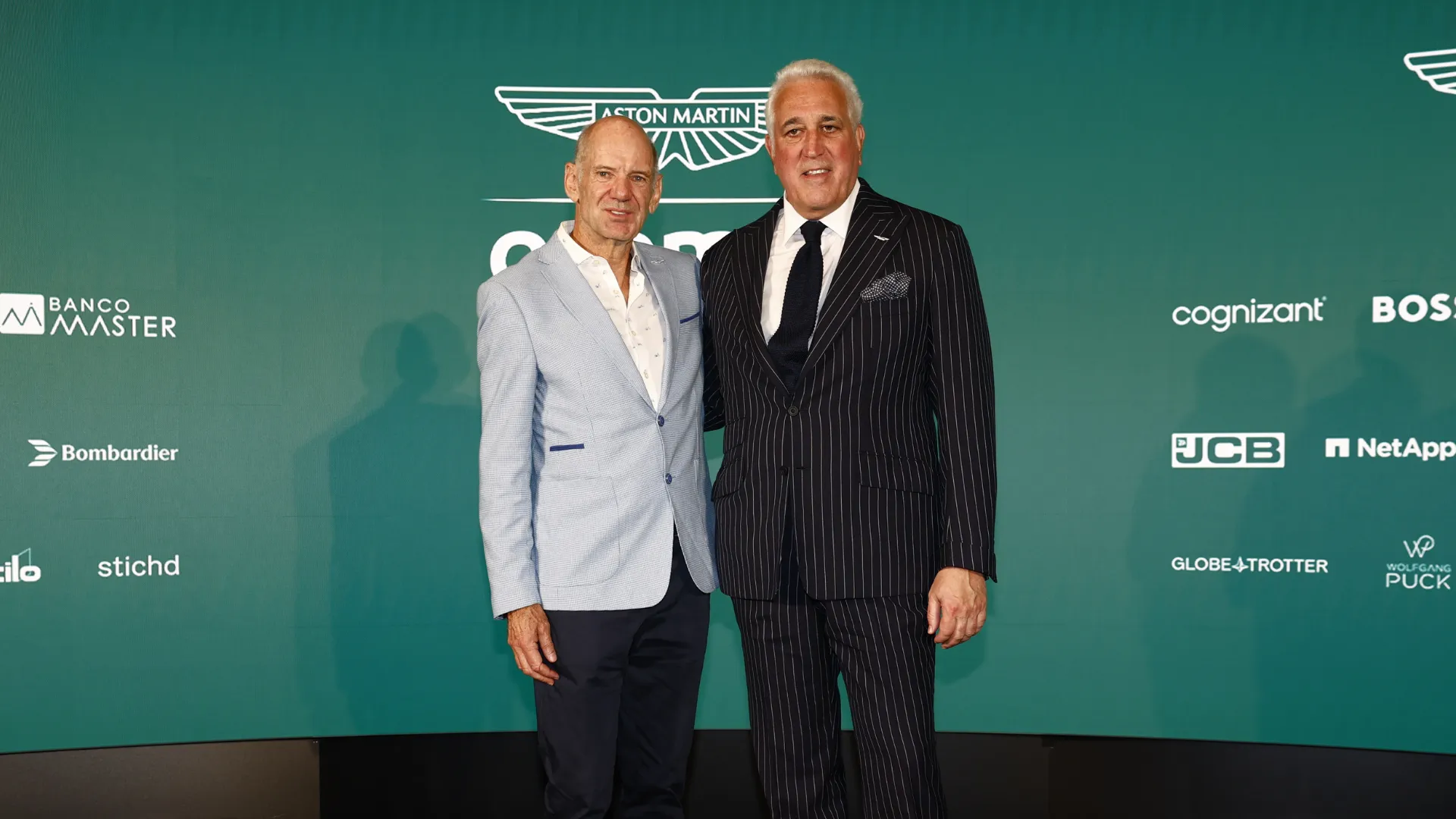 lawrence-stroll-and-adrian-newey_1j6q3r2v5zouw1u94sc8dovl4l.png