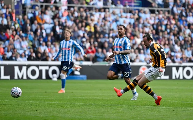 SOCCER-ENGLAND-COV-HUL:Soccer-Striker McBurnie salutes Hull City's discipline in perfect start