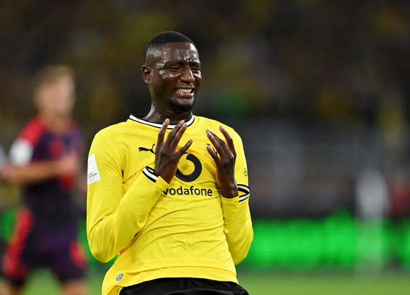 SOCCER-GERMANY-BVB-HSV:Soccer-Dortmund cruise to win as Elversberg claim historic victory in Bundesliga
