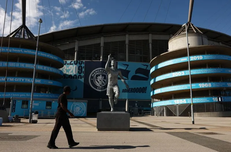 SOCCER-ENGLAND-MCI:Soccer-Premier League set for long wait as Man City face prospect of sanctions