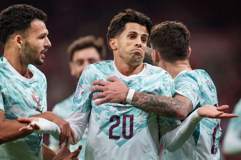SOCCER-NATIONS:Soccer-Joy for Germany as Ronaldo-less Portugal win in Denmark