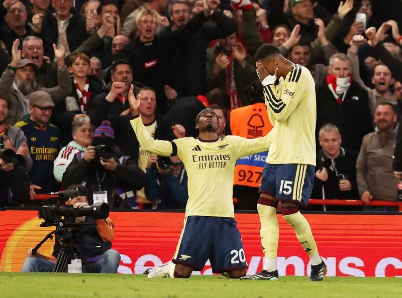 SOCCER-ENGLAND-NFO-ARS:Soccer-Slow-starting Arsenal make patience pay against Forest