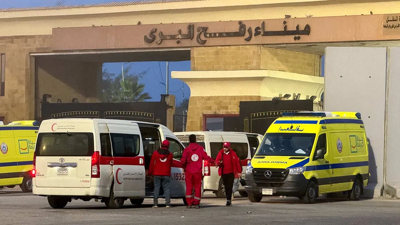 Egyptian ambulances go through the Rafah border crossing on the Egyptian side in Rafah, Egypt, February 10, 2026. Picture taken with a mobile phone. REUTERS/Stringer