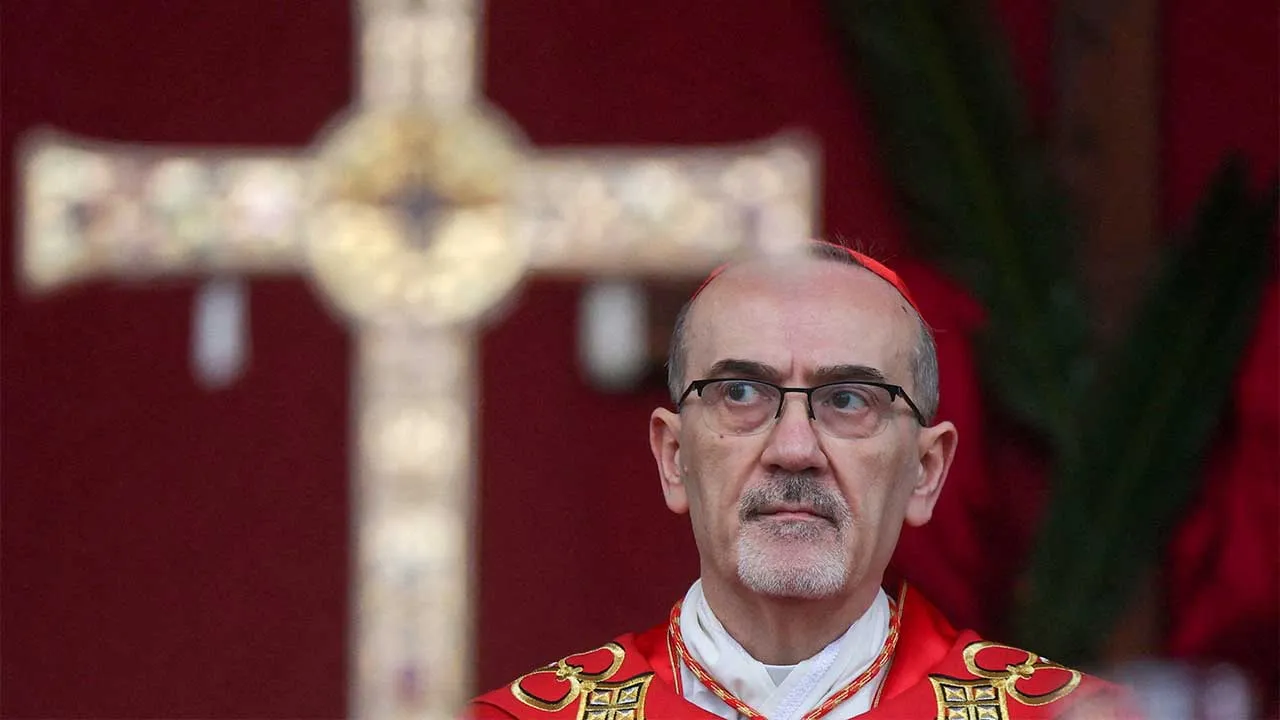 Cardinal Pierbattista Pizzaballa, the Latin Patriarch of Jerusalem, holds a prayer service at the Church of All Nations to mark Palm Sunday, following the cancellation of the traditional Palm Sunday procession from the Mount of Olives, amid restrictions on gathering in large groups and the U.S.-Israeli conflict with Iran, in Jerusalem, March 29, 2026. REUTERS/Ammar Awad/Pool TPX IMAGES OF THE DAY