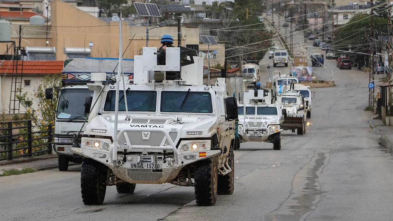 UNIFIL vehicles drive on a main road in Qlayaa, amid escalating hostilities between Israel and Hezbollah, as the U.S.-Israel conflict with Iran continues, in Qlayaa, southern Lebanon, March 27, 2026. REUTERS/Karamallah Daher