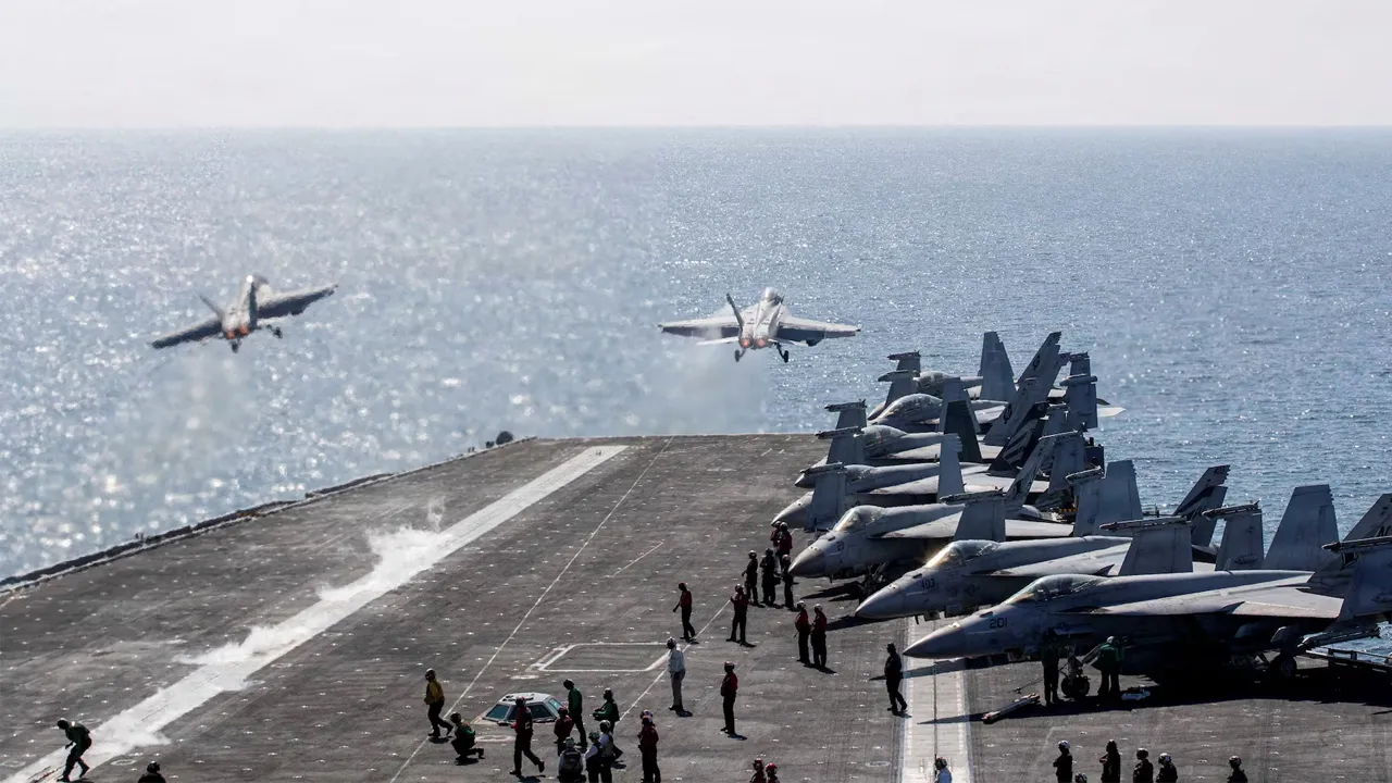 Two F/A-18 Super Hornets launch from the flight deck of the U.S. Navy Nimitz-class aircraft carrier USS Abraham Lincoln in support of the Operation Epic Fury attack on Iran from an undisclosed location March 3, 2026. U.S. Navy/Handout via REUTERS/File Photo Purchase Licensing Rights