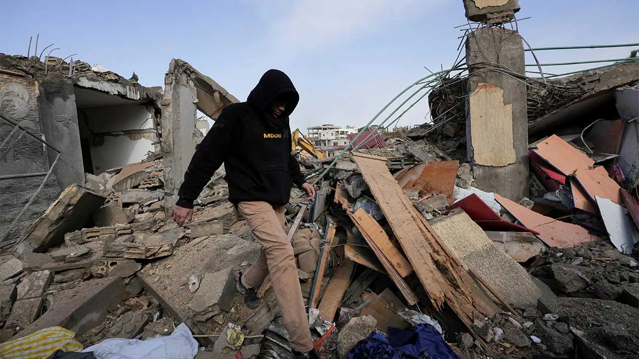 A man walks at the site of Israeli strike, amid escalating hostilities between Israel and Hezbollah, as the U.S.-Israeli conflict with Iran continues, in Kfar Hatta in southern Lebanon, April 5, 2026. REUTERS/Stringer TPX IMAGES OF THE DAY
