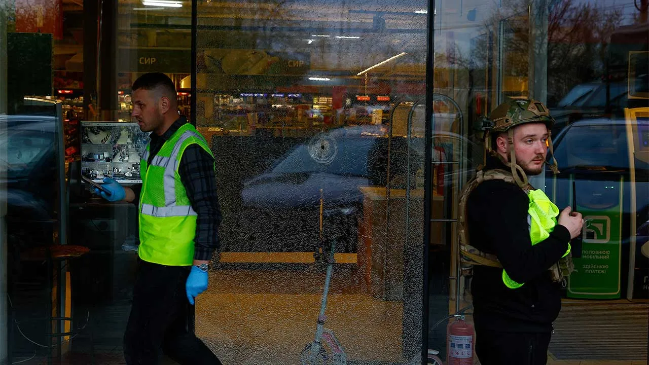 A bullet hole in the glass of a supermarket, where Ukrainian police killed a man who opened fire in a city district and barricaded himself into the supermarket on Saturday, Ukrainian Interior Minister Ihor Klymenko said, in Kyiv, Ukraine, April 18, 2026. REUTERS/Valentyn Ogirenko