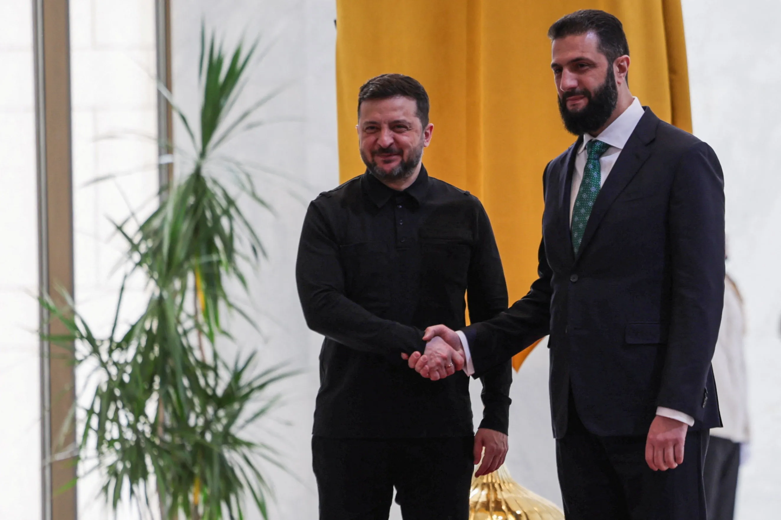 Ukraine's President Volodymyr Zelensky and Syria's President Ahmed al-Sharaa