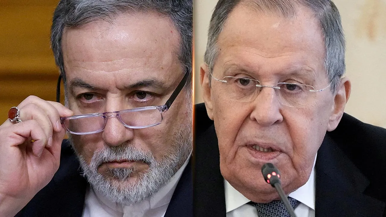 FILE PHOTO: Iranian Foreign Minister Abbas Araqchi adjusts glasses during a press conference following talks with Russian Foreign Minister Sergei Lavrov in Moscow, Russia, December 17, 2025. REUTERS/Ramil Sitdikov/Pool/File Photo