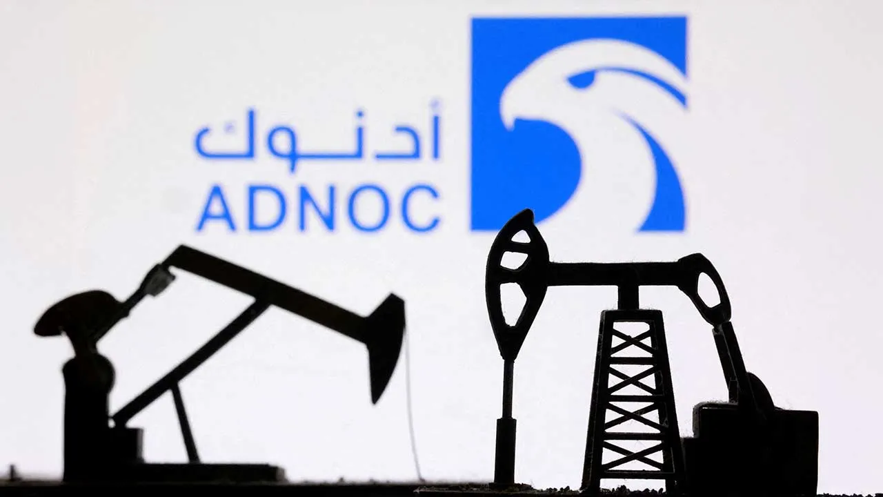 FILE PHOTO: 3D-printed oil pump jacks and the Abu Dhabi National Oil Company (ADNOC) appear in this illustration taken March 2, 2026. REUTERS/Dado Ruvic/Illustration/File Photo