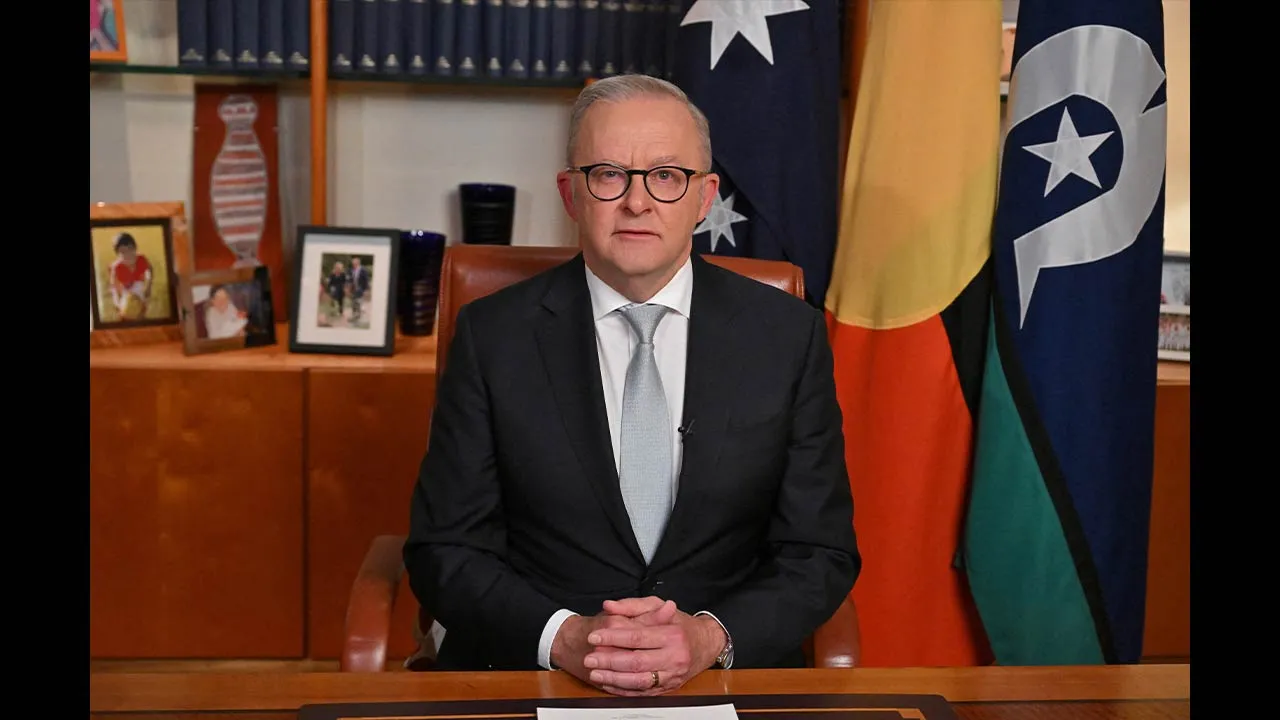 Prime Minister Anthony Albanese reacts after delivering a pre-recorded address to the nation in his office at Parliament House, Canberra, Australia, April 1, 2026. AAP/ Mick Tsikas/via REUTERS