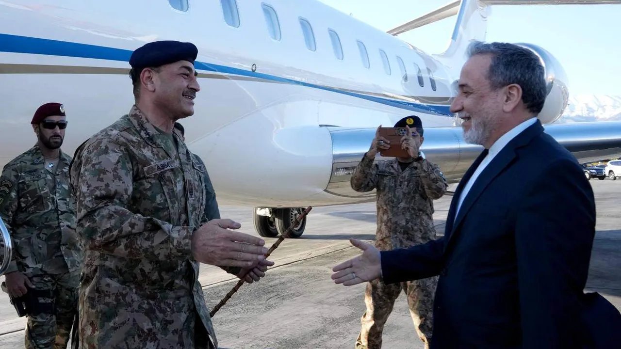In this photo released by Telegram channel of the Iranian Foreign Minister Abbas Araghchi, Foreign Minister Abbas Araghchi, right, welcomes Pakistan's Army Chief Field Marshal Gen. Asim Munir upon his arrival in Tehran, Iran, Wednesday, April 15, 2026. (Telegram channel of the the Iranian Foreign Minister Abbas Araghchi, via AP)