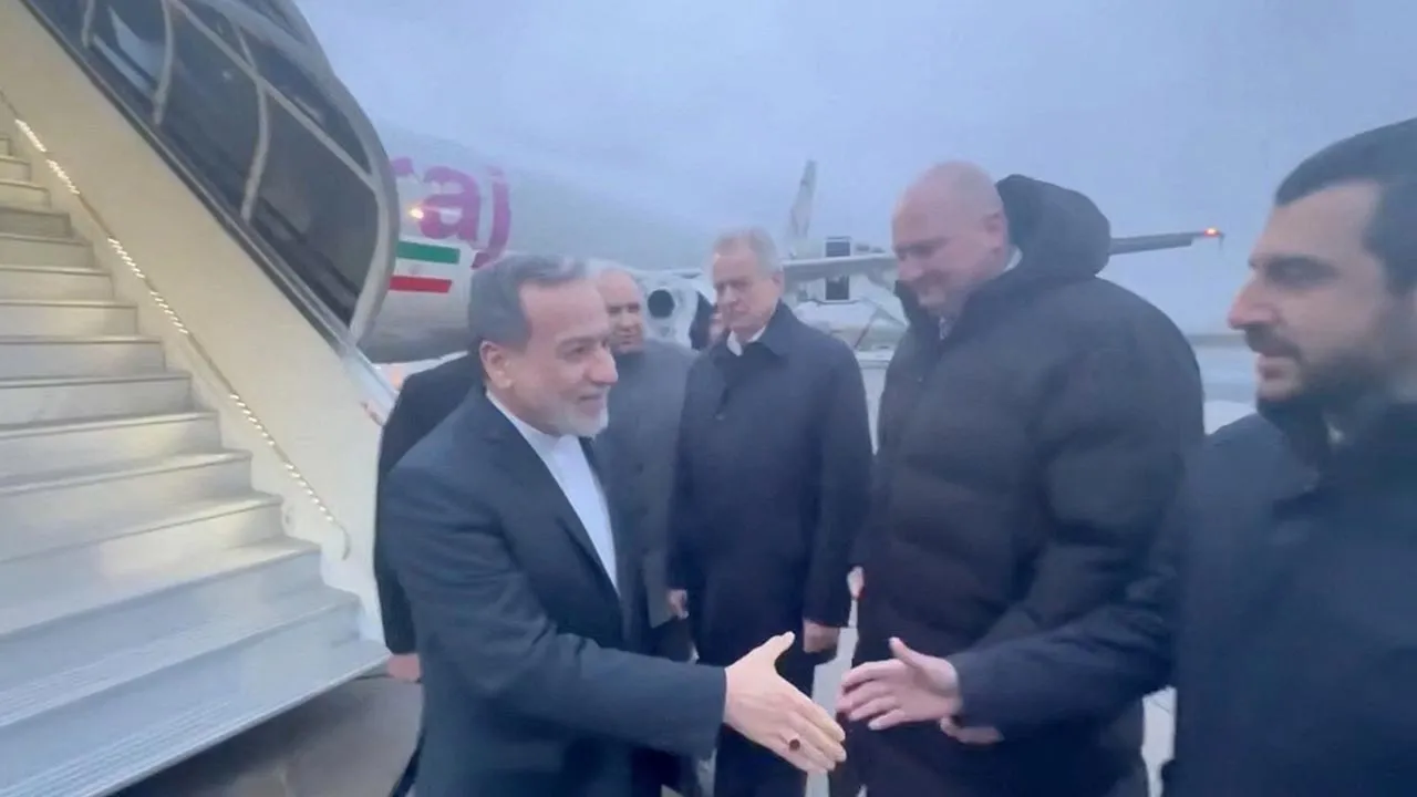 Iran's Foreign Affairs Minister Abbas Araqchi is greeted by officials, according to Iran's media, during his visit to Russia for talks with Russian President Vladimir Putin, in a place given as St. Petersburg, Russia, in this screenshot from a video released on April 27, 2026. Seyed Abbas Araghchi via Telegram/Handout via REUTERS 