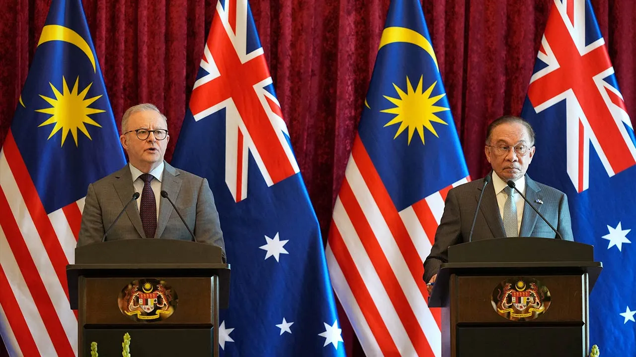 Australian Prime Minister Anthony Albanese speaks next to Malaysian Prime Minister Anwar Ibrahim during a press conference in Putrajaya, Malaysia, Thursday, April 16, 2026. Vincent Thian/Pool via REUTERS
