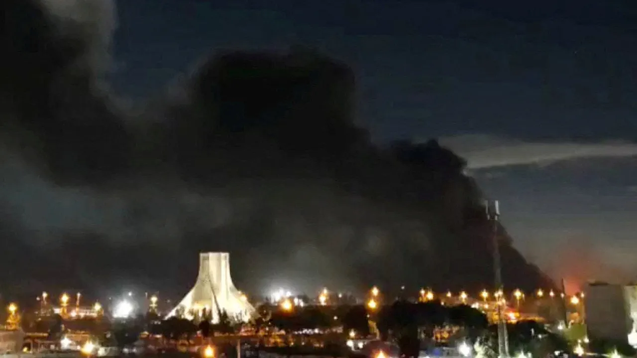 Smoke rises over Azadi Square following a strike, amid the U.S.-Israeli conflict with Iran, in Tehran, Iran, April 6, 2026, in this screengrab obtained from a social media video. Social Media via REUTERS