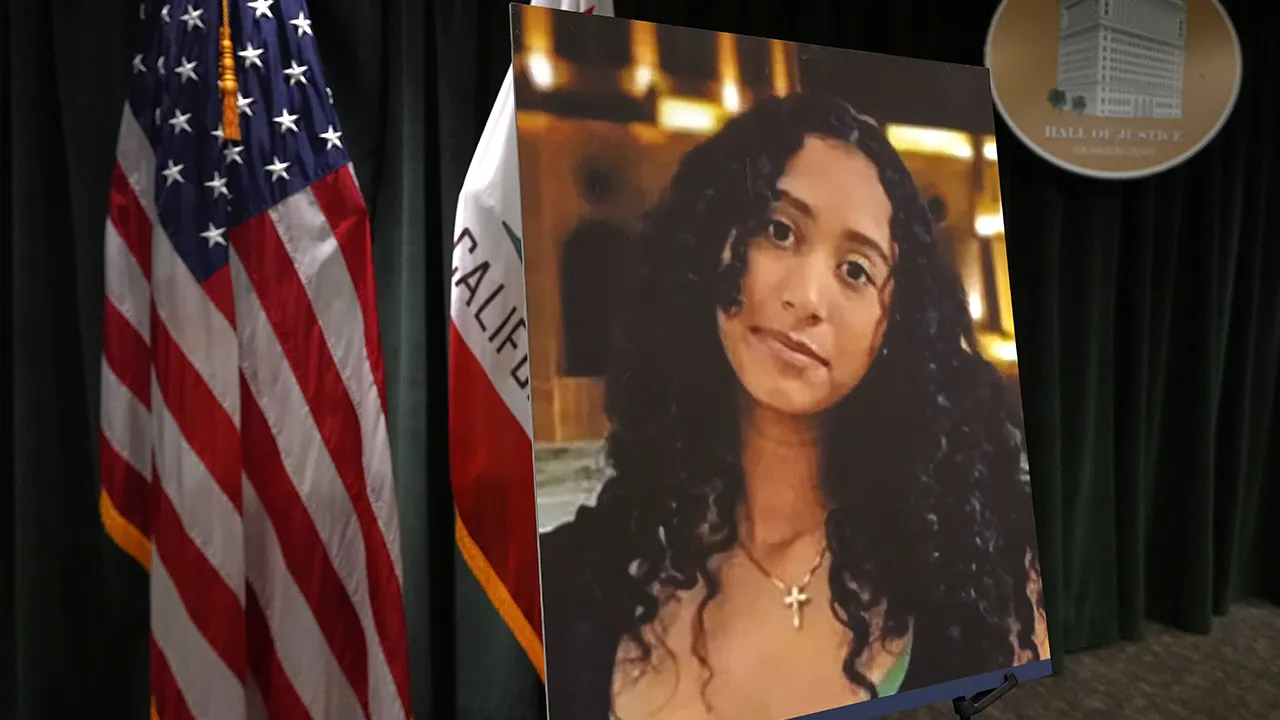 A photo of Celeste Rivas Hernandez is displayed Monday, April 20, 2026, in Los Angeles for a press conference regarding the case of singer D4vd, who was charged on suspicion of killing the 14-year-old girl whose dismembered body was found in his car. (AP Photo/Damian Dovarganes)