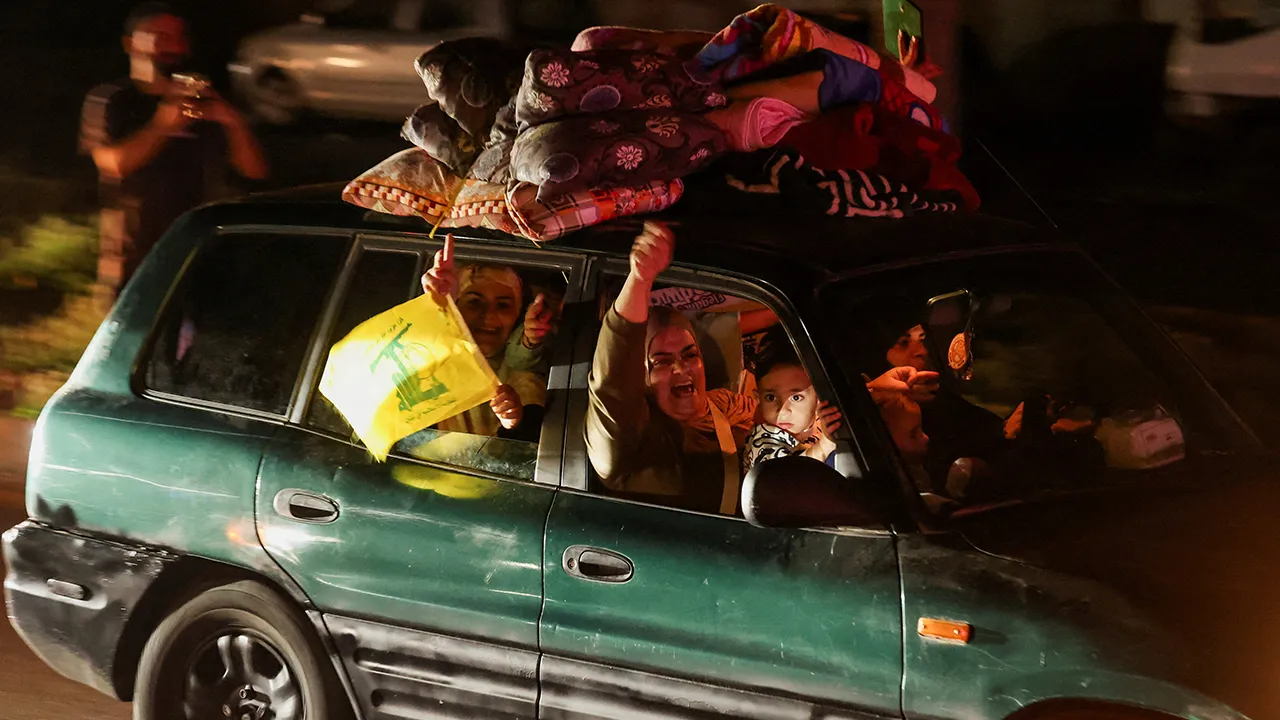 Displaced people react as they return to their homes in a vehicle carrying belongings on its roof after a 10-day ceasefire between Lebanon and Israel went into effect, in Sidon, Lebanon, April 17, 2026. REUTERS/Aziz Taher TPX IMAGES OF THE DAY