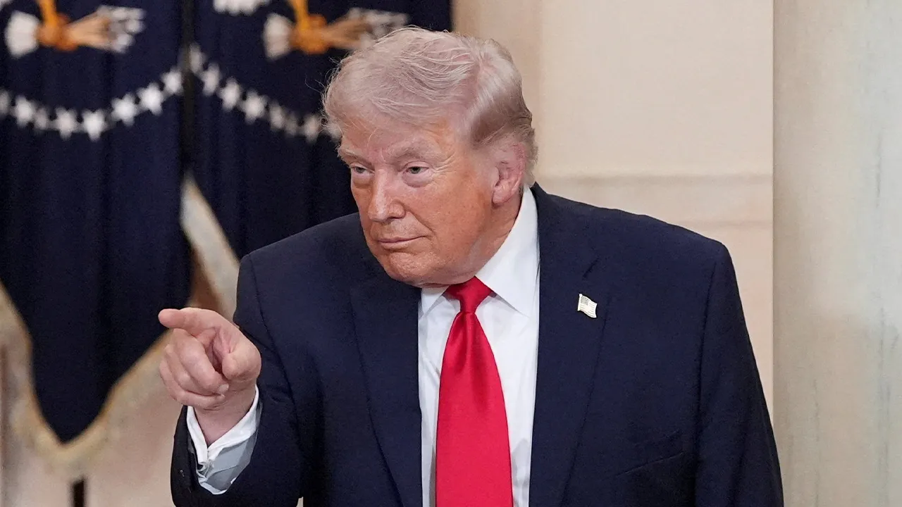 U.S. President Donald Trump gestures after delivering an address to the nation about the Iran war at the White House in Washington, D.C., U.S. April 1, 2026. Alex Brandon/Pool via REUTERS
