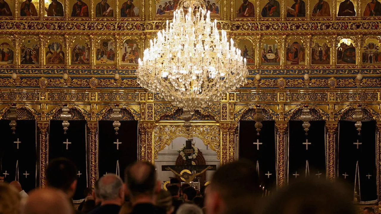 Orthodox faithful attend a liturgy on Holy Thursday during Orthodox Easter Week services at Cathedral of the Apostle Barnabas in Nicosia, Cyprus, April 9, 2026. REUTERS/Yiannis Kourtoglou