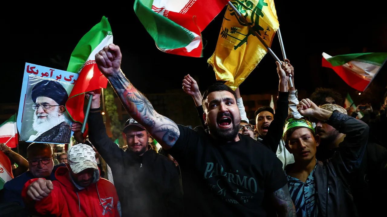 People shout slogans as they gather after a two-week ceasefire in the Iran war was announced, in Tehran, Iran, April 8, 2026. Majid Asgaripour/WANA (West Asia News Agency) via REUTERS ATTENTION EDITORS - THIS PICTURE WAS PROVIDED BY A THIRD PARTY.