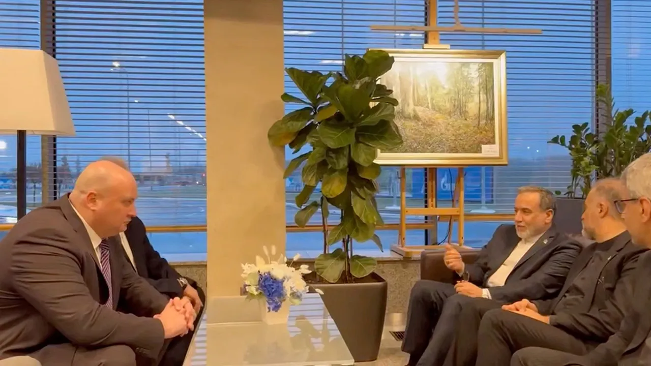 Iran's Foreign Affairs Minister Abbas Araqchi talks with officials, according to Iran's media, during his visit to Russia for talks with Russian President Vladimir Putin, in a place given as St. Petersburg, Russia, in this screenshot from a video released on April 27, 2026. Seyed Abbas Araghchi via Telegram/Handout via REUTERS