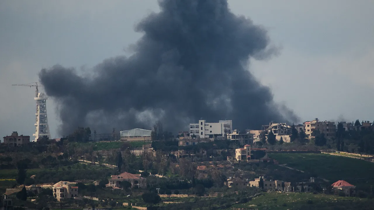 Smoke rises following Israeli attack in southern Lebanon as seen from northern Israel, Sunday, April 12, 2026. (AP Photo/Ariel Schalit)