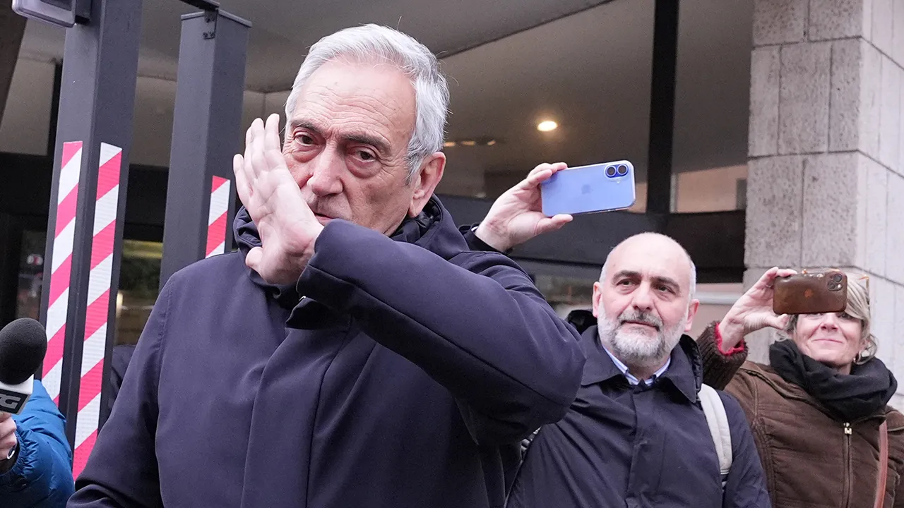 Italy's soccer federation president Gabriele Gravina leaves the FIGC (italian soccer federation) headquarters in Rome, Thursday April 2, 2026 after resigning amid political pressure after the national team failed to qualify for a third consecutive World Cup. (Alfredo Falcone/LaPresse via AP)