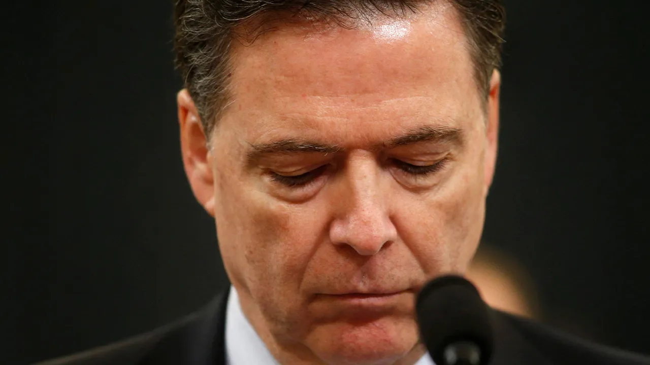 FILE PHOTO: FBI Director James Comey testifies before the House Intelligence Committee hearing into alleged Russian meddling in the 2016 U.S. election on Capitol Hill in Washington, U.S., March 20, 2017. REUTERS/Joshua Roberts/File Photo