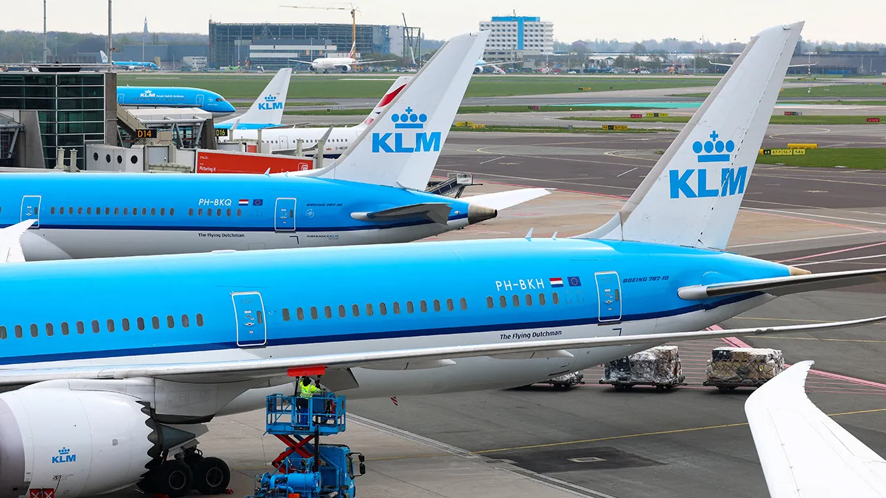 A KLM aircraft is being refuelled for a subsequent flight at Amsterdam Airport Schiphol in Schiphol, Netherlands, April 15, 2026. REUTERS/Piroschka van de Wouw
