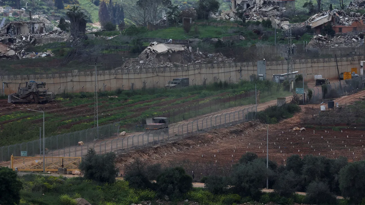 Damaged buildings at Kafr Kila following Israeli army activity across the border between Israel and Lebanon, as seen from Metula on the Israeli side of the border, April 9, 2026. REUTERS/Ammar Awad
