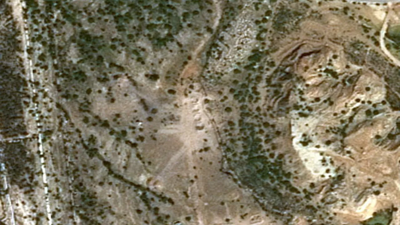 A satellite image shows damage on Kharg Island, Iran, after U.S. strikes, amid the U.S.-Israeli conflict with Iran, March 14, 2026. SPOT © CNES 2026, Distribution Airbus DS/Handout via REUTERS