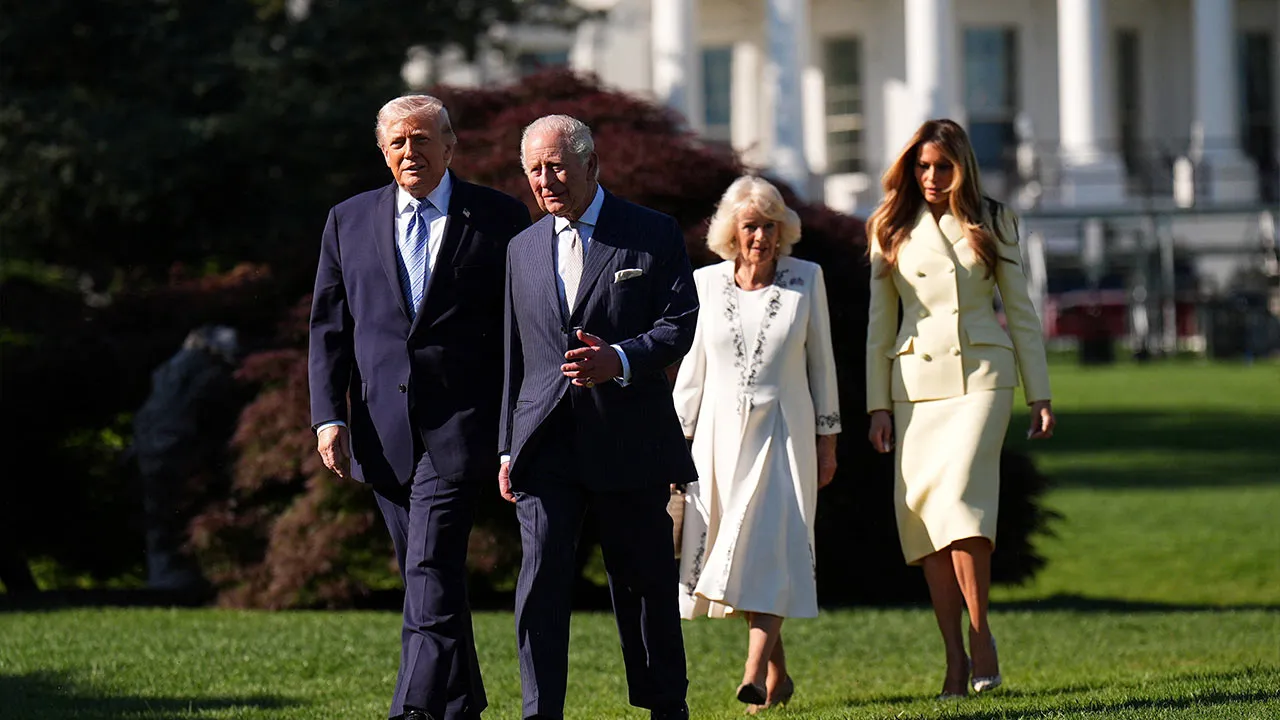 Britain's King Charles and Queen Camilla walk as they join US President Donald Trump and US First Lady Melania for a tour of the White House beehives in the grounds of the White House, on day one of the state visit to the US, in Washington D.C., U.S., April 27, 2026. Aaron Chown/Pool via REUTERS
