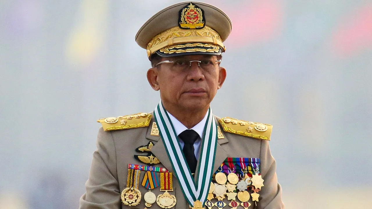 FILE PHOTO: Myanmar's junta chief Senior General Min Aung Hlaing, who ousted the elected government in a coup on February 1, presides an army parade on Armed Forces Day in Naypyitaw, Myanmar, March 27, 2021. REUTERS/Stringer/File Photo