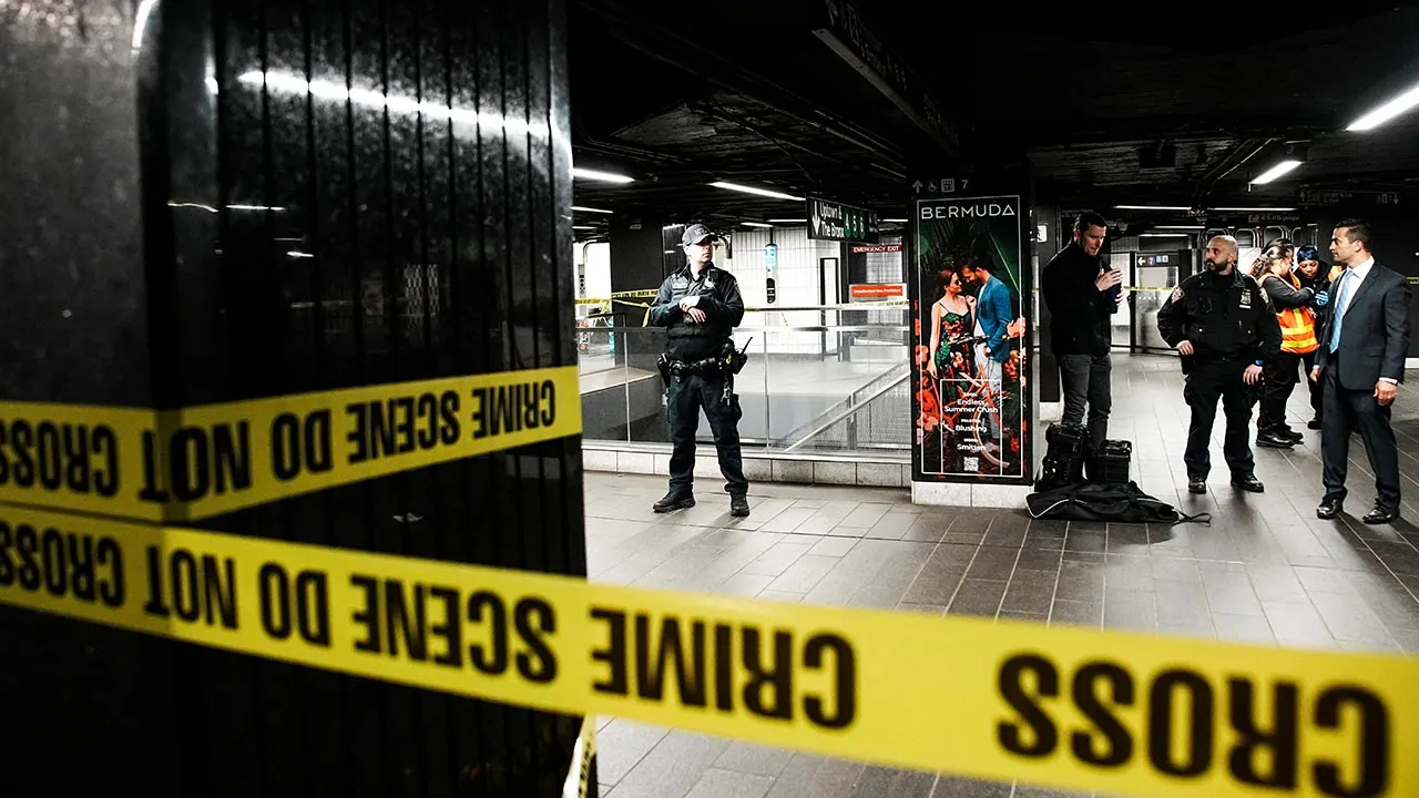 New York City Police Department (NYPD) officers stand guard near the crime scene where three people were attacked inside the subway system at Grand Central Station in New York City, U.S., April 11, 2026. REUTERS/Eduardo Munoz
