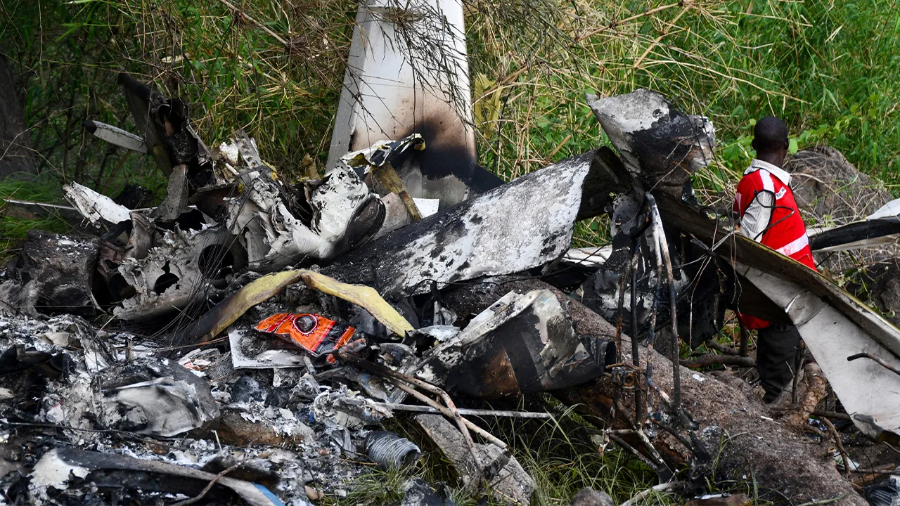 A member of the South Sudan Red Cross walks at the wreckage of a Cessna 208 Caravan operated by CityLink Aviation, that lost communication and crashed while flying from Yei to Juba International Airport, in Juba, South Sudan April 27, 2026. REUTERS/Samir Bol