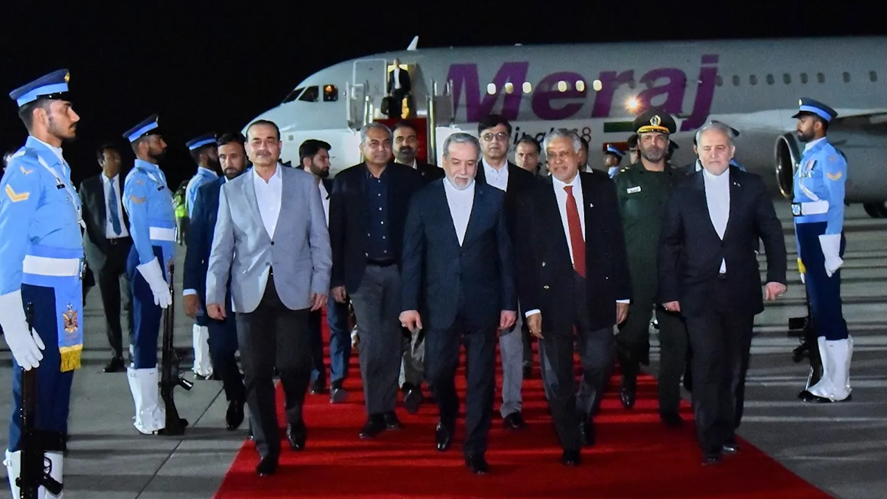 In this photo provided by the Pakistan Ministry of Foreign Affairs, Iranian Foreign Minister Abbas Araghchi, center, is greeted by Pakistan Foreign Minister Ishaq Dar, second right, and Army Chief Field Marshal Asim Munir, third left, upon his arrival at Nur Khan airbase in Rawalpindi, Pakistan, Friday, April 24, 2026. (Pakistan Ministry of Foreign Affairs via AP)