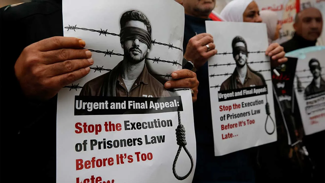 Palestinians take part in a protest against the Israeli death penalty law to be imposed on Palestinians convicted of deadly attacks, in Hebron, in the Israeli-occupied West Bank, April 2, 2026. REUTERS/Yosri Aljamal