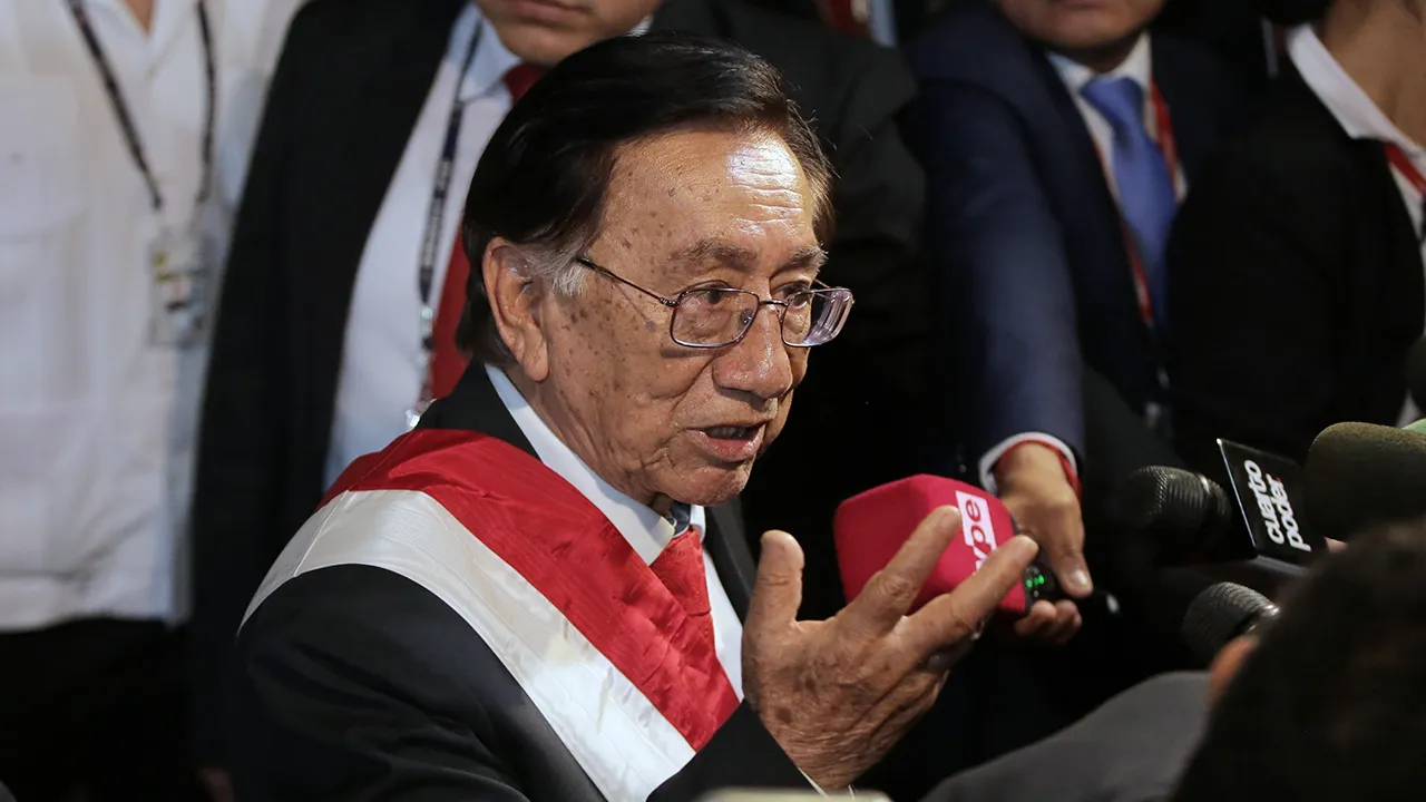 Interim President Jose Maria Balcazar speaks to reporters upon arriving at the presidential palace after he was appointed by lawmakers, in Lima, Peru, Feb. 18, 2026. (AP Photo/Gerardo Marin, File)