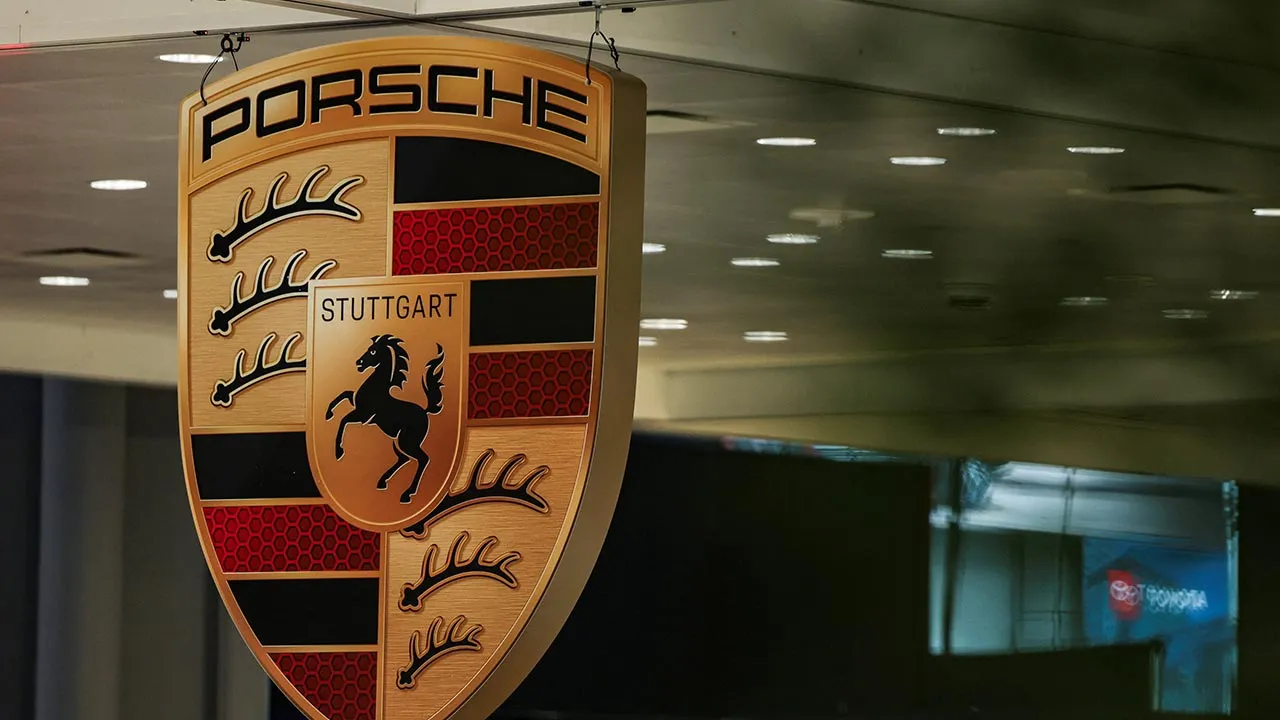 A Porsche logo is displayed during the New York International Auto Show in New York City, U.S., April 1, 2026. REUTERS/Jeenah Moon