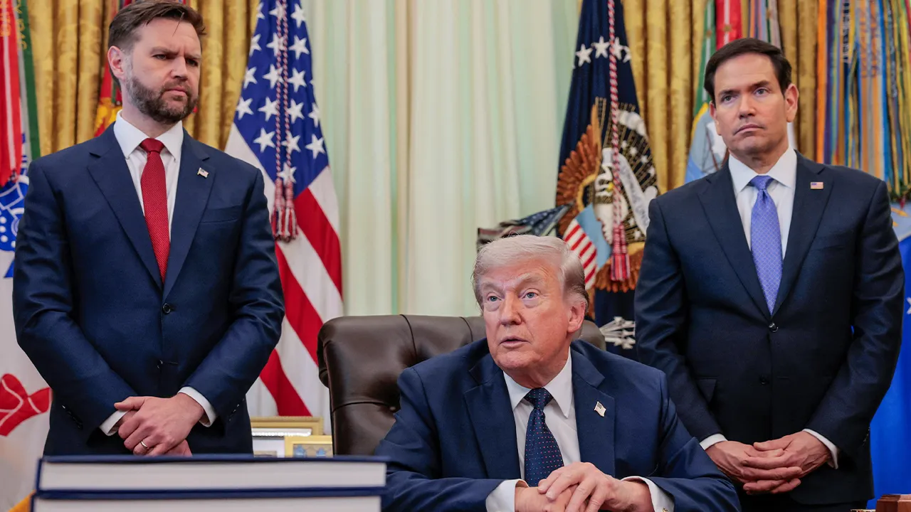 U.S. President Donald Trump speaks in the Oval Office, with Vice President JD Vance and Secretary of State Marco Rubio standing behind him, at the White House in Washington, D.C., U.S., April 23, 2026. REUTERS/Kylie Cooper