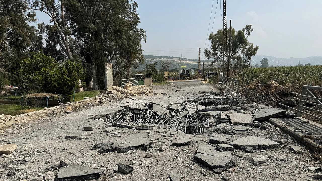 The damaged Qasmiyeh Bridge over the Litani river, after it was hit by an Israeli strike in southern Lebanon on Wednesday, March 18, following an escalation between Hezbollah and Israel amid the U.S.-Israeli conflict with Iran, Lebanon, March 19, 2026. Picture taken with a mobile phone. REUTERS/Ali Hankir
