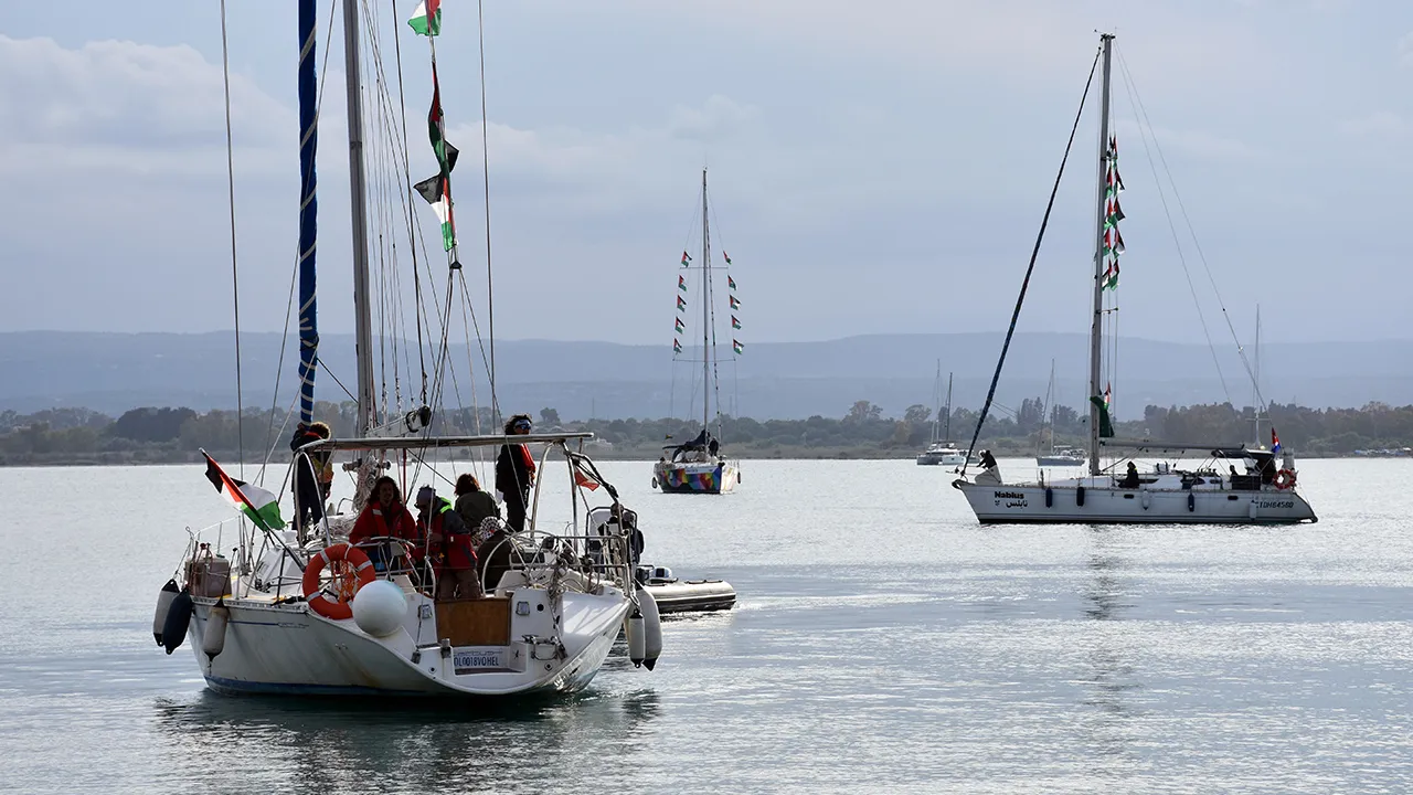 SICILY, ITALY - APRIL 23: Boats of the 'Global Sumud Flotilla 2026 Spring Mission,' which departed from Barcelona, Spain on April 12, arrive at the Port of Syracuse on the island of Sicily, Italy on April 23, 2026. The boats, supported by NGOs from over 50 countries aiming to break the Israeli blockade on Gaza and deliver humanitarian aid, met with other vessels that completed preparations in Italy for the flotilla's second voyage. Baris Seckin / Anadolu