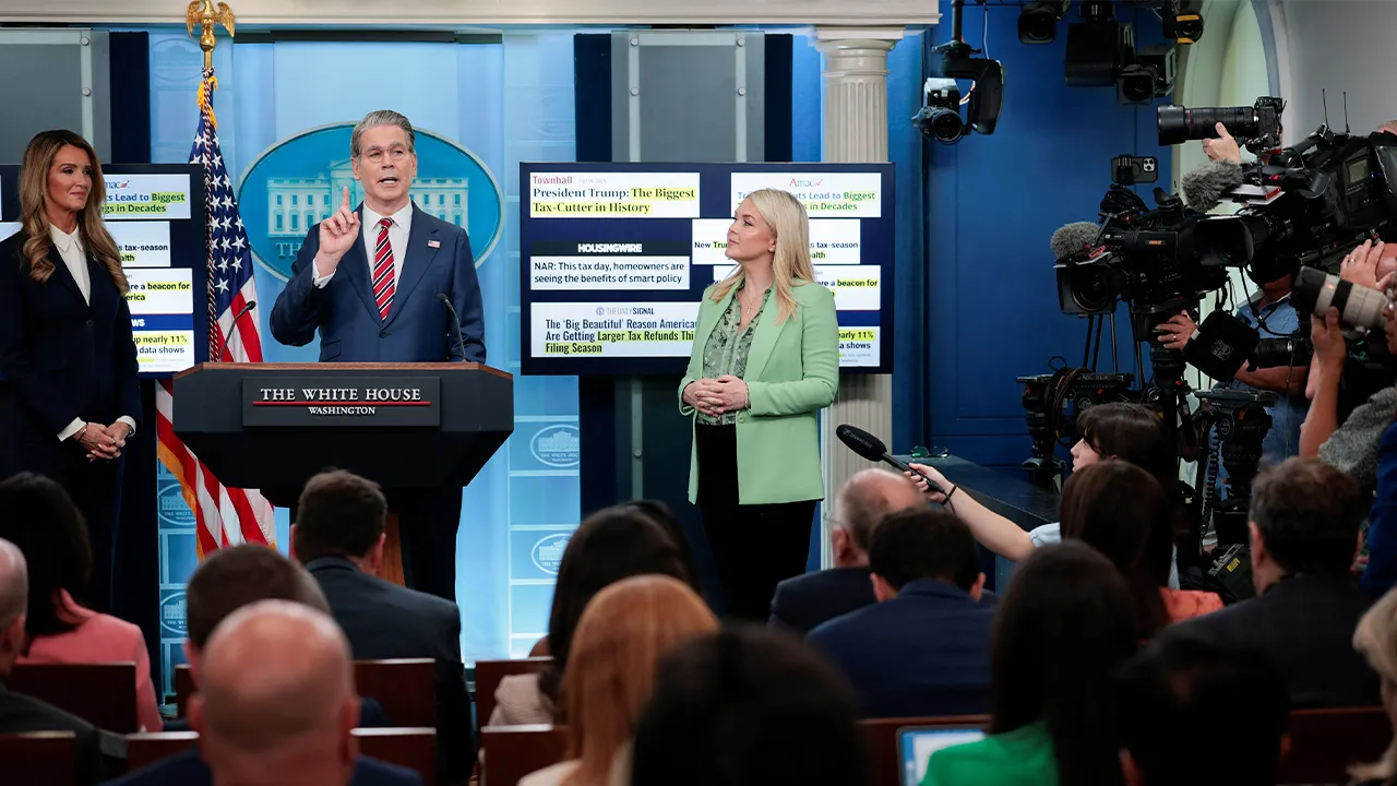 U.S. Treasury Secretary Scott Bessent speaks next to White House Press Secretary Karoline Leavitt and Small Business Administrator Kelly Loeffler during a press briefing in the James S. Brady Press Briefing Room at the White House in Washington, D.C., U.S., April 15, 2026. REUTERS/Evan Vucci