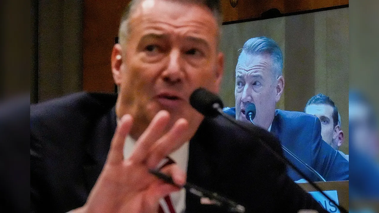 FILE PHOTO: U.S. Immigration and Customs Enforcement (ICE) Acting Director Todd Lyons attends a Senate Homeland Security and Government Affairs Committee hearing on Capitol Hill in Washington, D.C., U.S., February 12, 2026. REUTERS/Kent Nishimura/File Photo